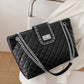 Twisted Lock Quilted Tote Bag